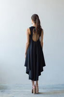 Brie open back flare dress with asymmetrical hem in black
